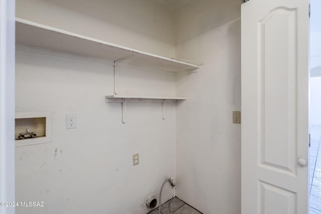 laundry area featuring hookup for a washing machine and laundry area