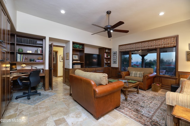 living room featuring ceiling fan