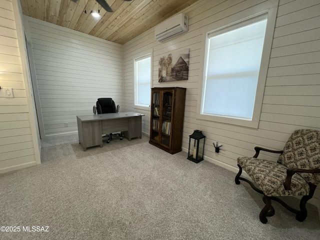 16911 S Joshua Tree Rd, Mayer, AZ 86333 - office space featuring a wall unit AC, wooden ceiling, carpet flooring, wooden walls, and a ceiling fan