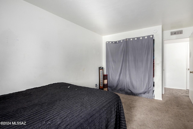 unfurnished bedroom with carpet