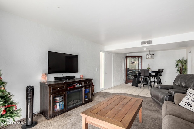 living room featuring light carpet