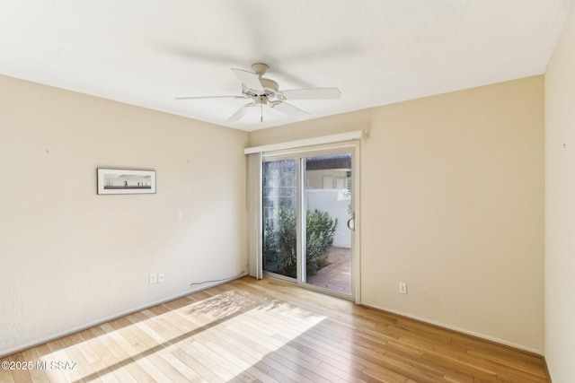 unfurnished room featuring light hardwood / wood-style flooring and ceiling fan