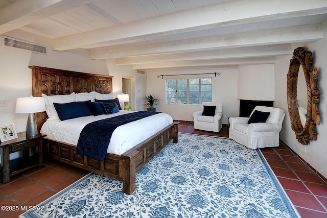 bedroom featuring beam ceiling