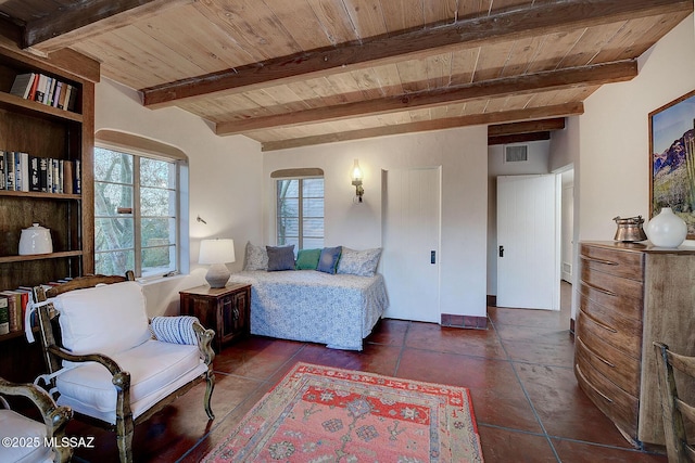 tiled bedroom with wooden ceiling and beam ceiling