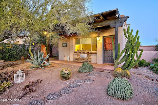 view of front of property with a patio