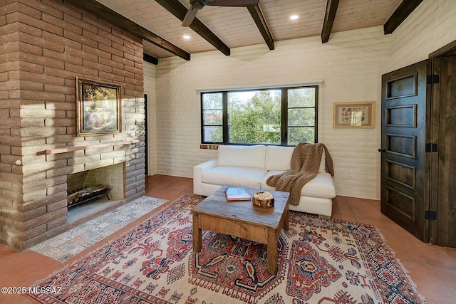 living room featuring wood ceiling, beamed ceiling, and brick wall