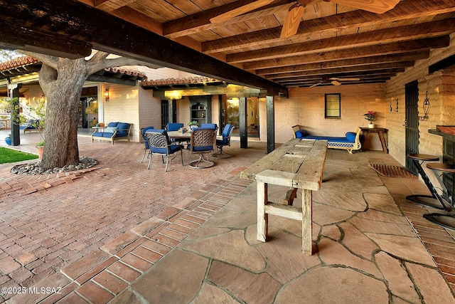 view of patio with ceiling fan