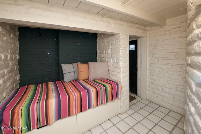 tiled bedroom with wooden ceiling and beam ceiling