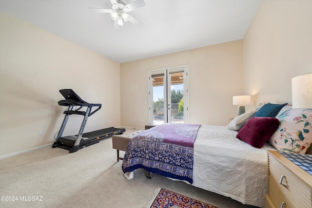 carpeted bedroom with access to outside and ceiling fan