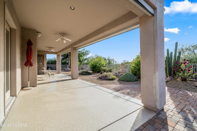 view of patio featuring ceiling fan