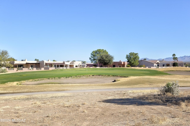 surrounding community featuring a yard