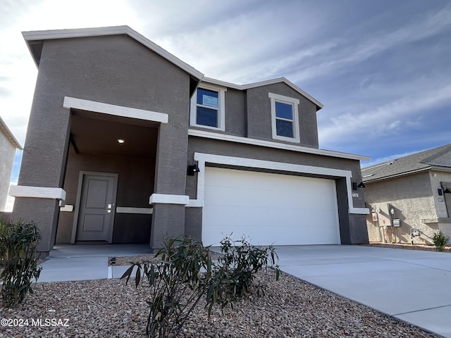 view of front of house with a garage