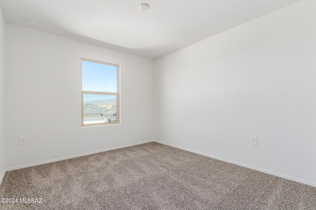 unfurnished room featuring carpet floors