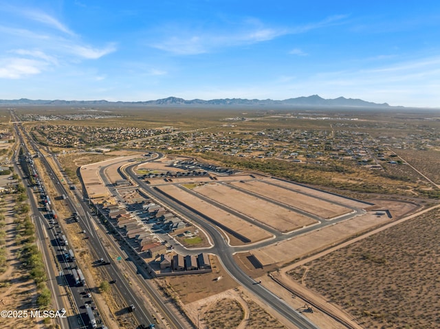 drone / aerial view featuring a mountain view