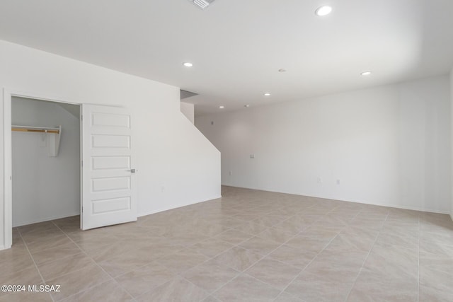 basement with light tile patterned floors