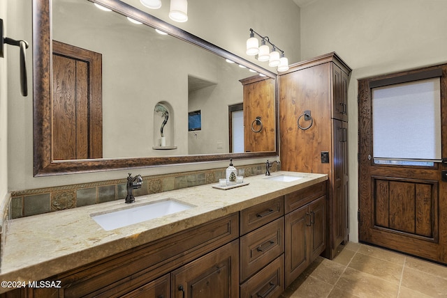 bathroom featuring tile patterned floors and vanity