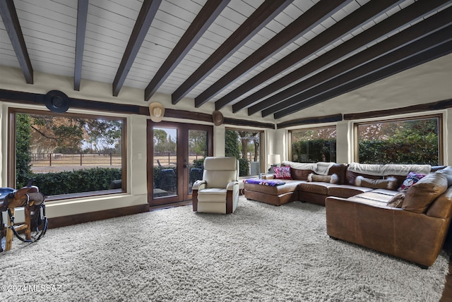 interior space with vaulted ceiling with beams