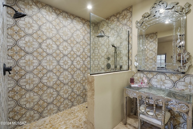 bathroom with decorative backsplash and a tile shower