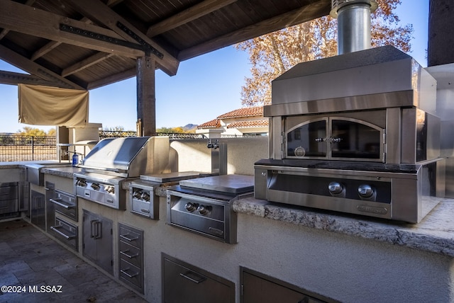 view of patio / terrace with a grill and exterior kitchen