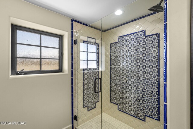 bathroom with an enclosed shower