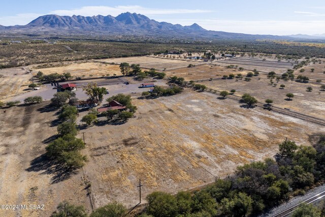 drone / aerial view featuring a mountain view