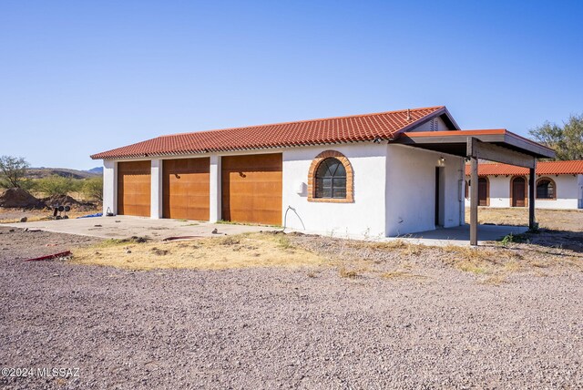 view of mediterranean / spanish-style house