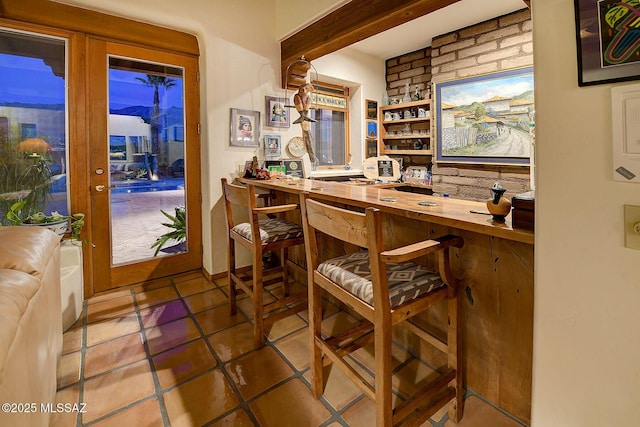 bar with tile patterned floors