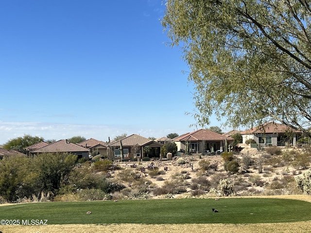 view of front of property with a front lawn