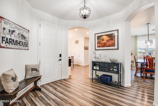 14286 E Lazy Jake Ln, Vail, AZ 85641 - foyer entrance featuring hardwood / wood-style flooring and a notable chandelier
