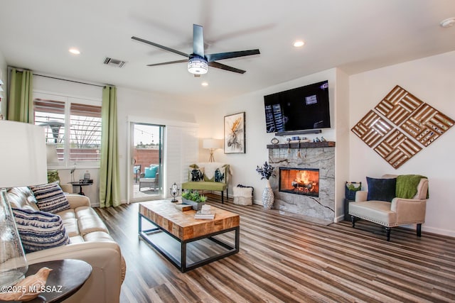 14286 E Lazy Jake Ln, Vail, AZ 85641 - living room featuring a fireplace, wood-type flooring, and ceiling fan