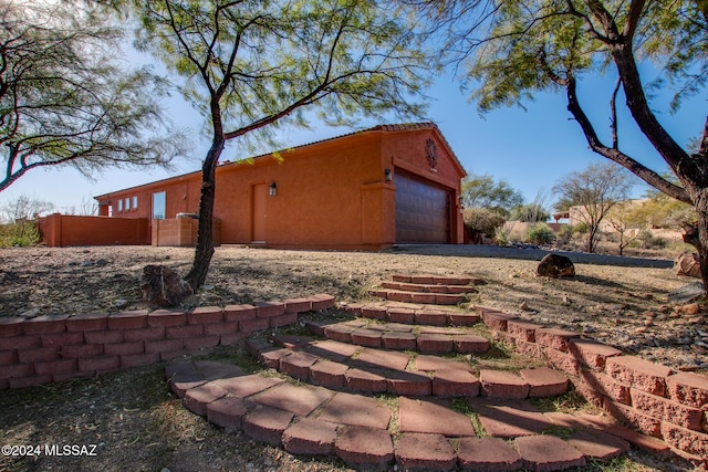 14286 E Lazy Jake Ln, Vail, AZ 85641 - exterior space featuring an outbuilding and a garage