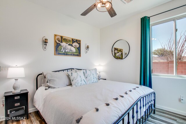 14286 E Lazy Jake Ln, Vail, AZ 85641 - bedroom featuring dark hardwood / wood-style floors and ceiling fan