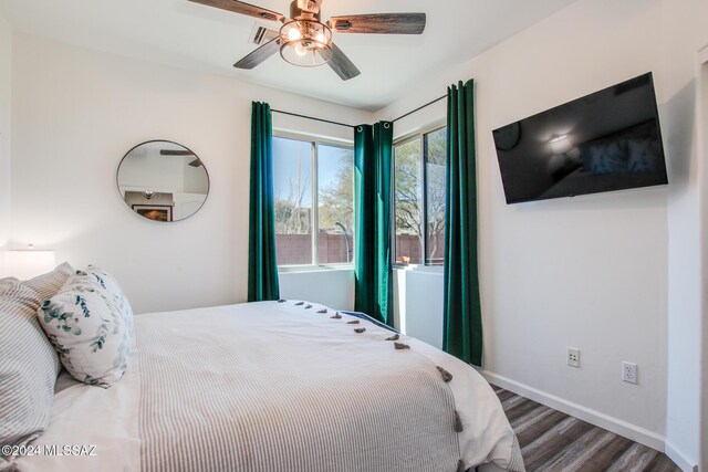 14286 E Lazy Jake Ln, Vail, AZ 85641 - bedroom featuring ceiling fan and wood-type flooring