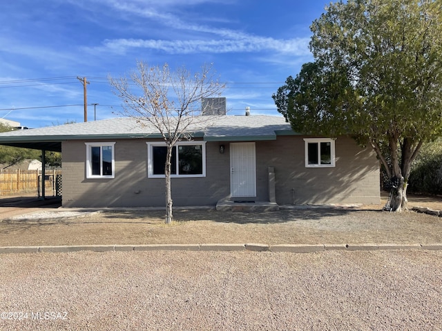 view of front of house featuring a carport