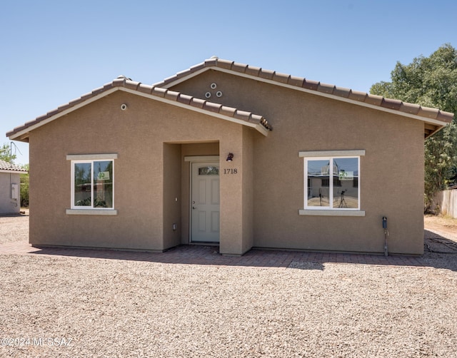 rear view of house with a patio area