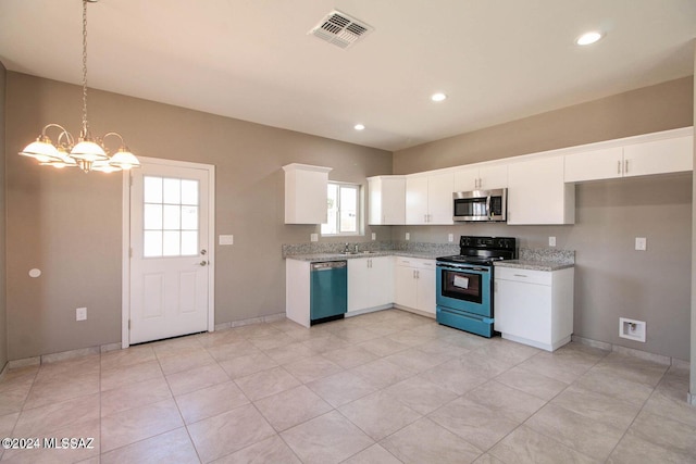 kitchen featuring pendant lighting, an inviting chandelier, white cabinets, sink, and appliances with stainless steel finishes