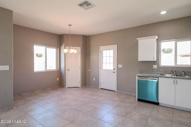 kitchen with stainless steel dishwasher, a notable chandelier, white cabinets, and hanging light fixtures