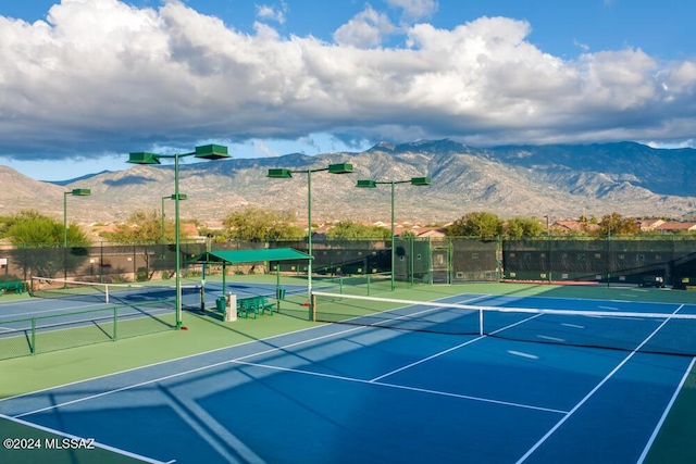 view of sport court with a mountain view