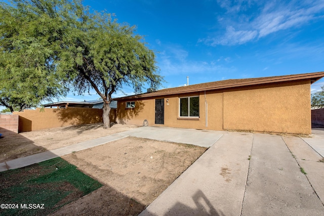 back of house featuring a patio