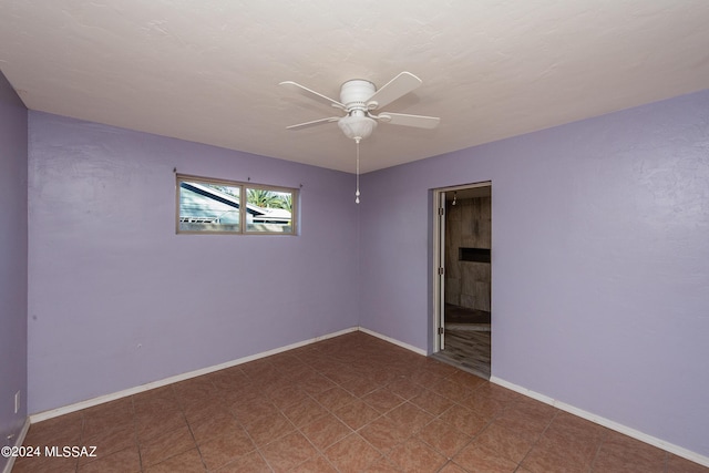 unfurnished room featuring ceiling fan