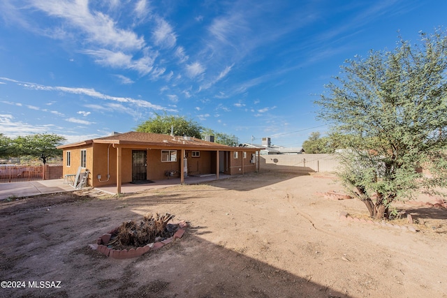 rear view of house with a patio area