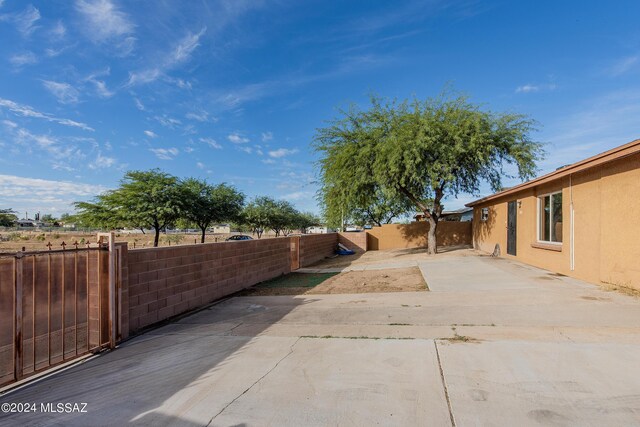 Tucson, AZ 85756 - fenced backyard with a patio area