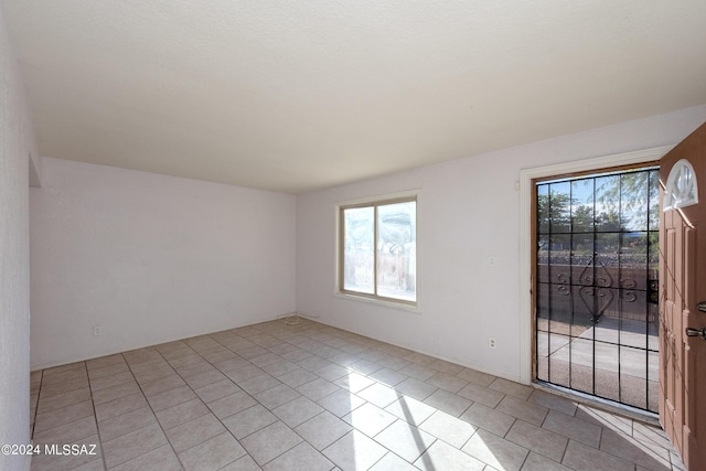 view of tiled empty room