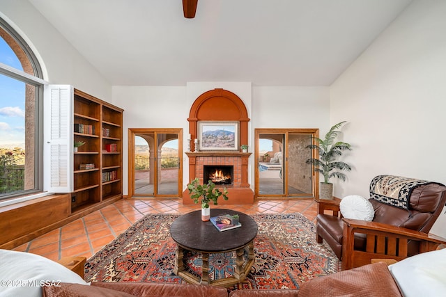 living room featuring light tile patterned flooring and french doors