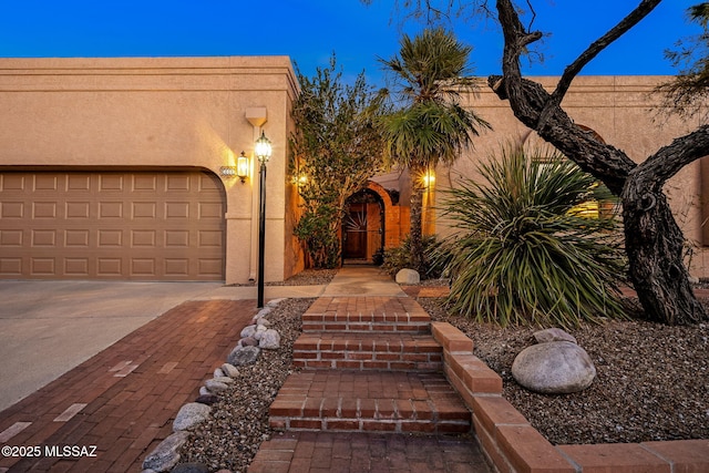 view of front of home with a garage