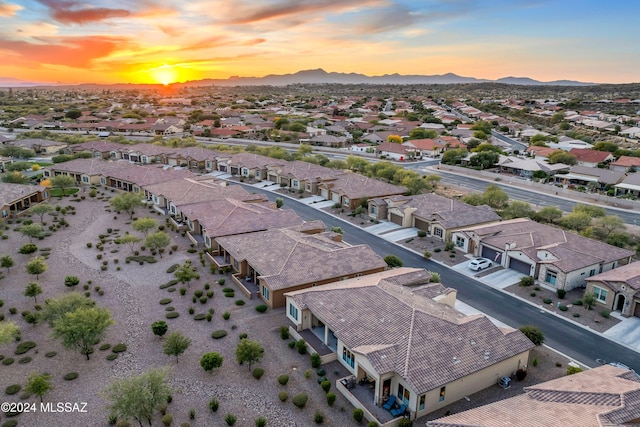 aerial view at dusk with a mountain view