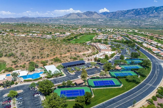 birds eye view of property featuring a mountain view