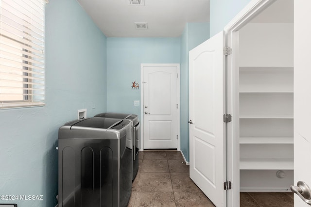 laundry room featuring washer and dryer