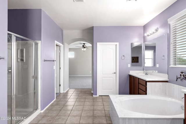 bathroom featuring ceiling fan, vanity, independent shower and bath, and tile patterned flooring