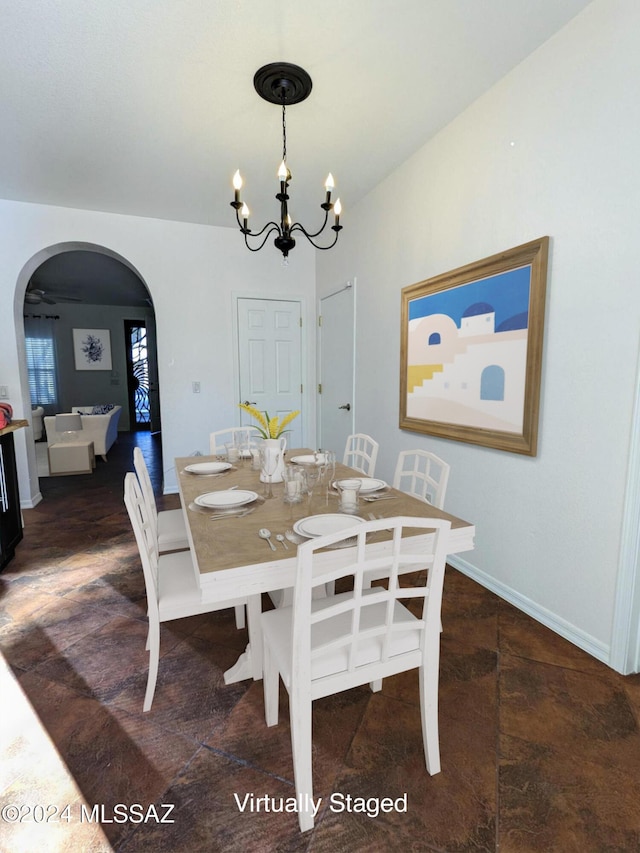 dining area with a chandelier